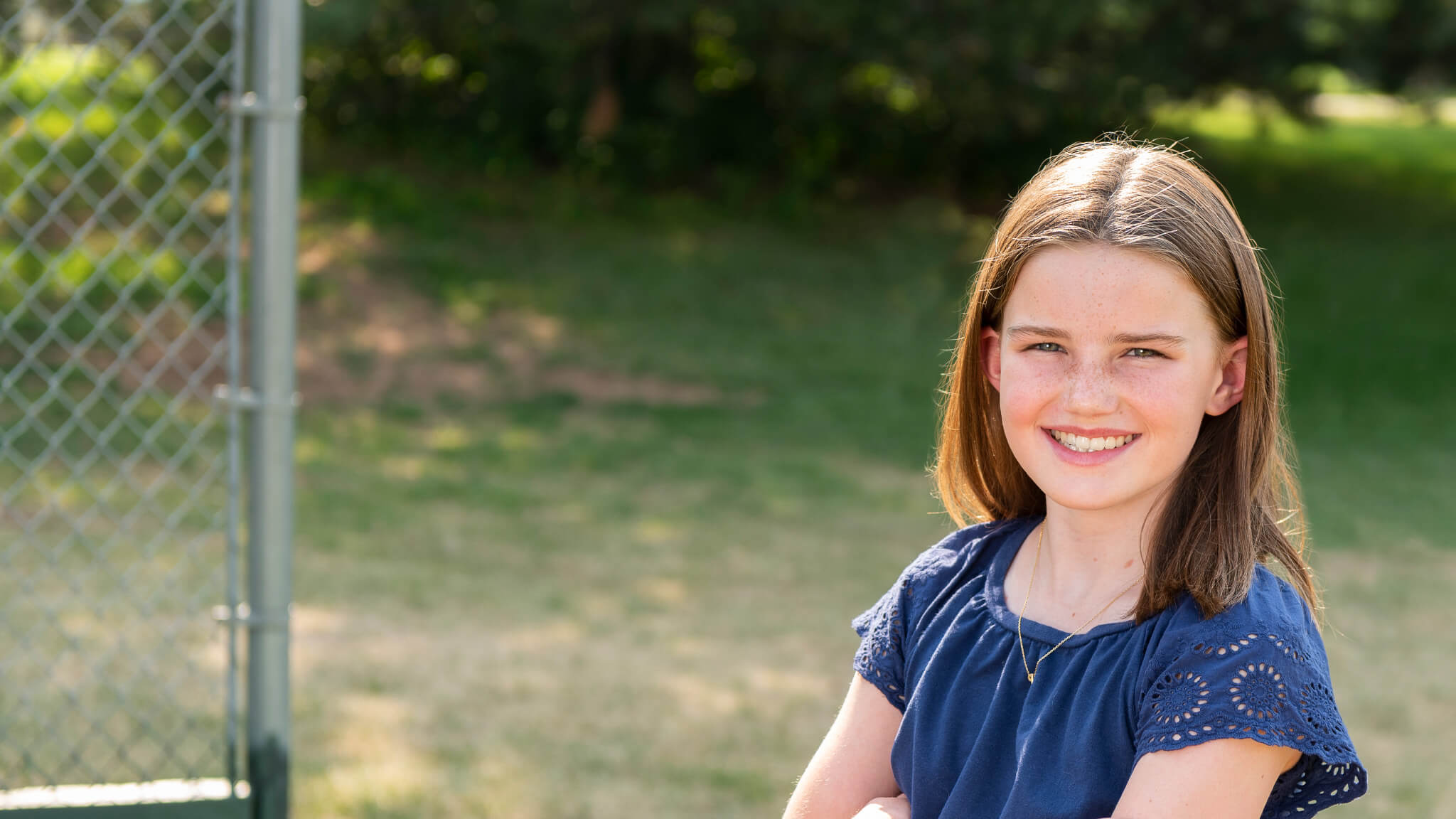young girl with braces smiling