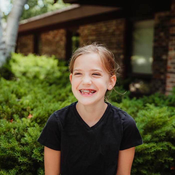 young girl with braces