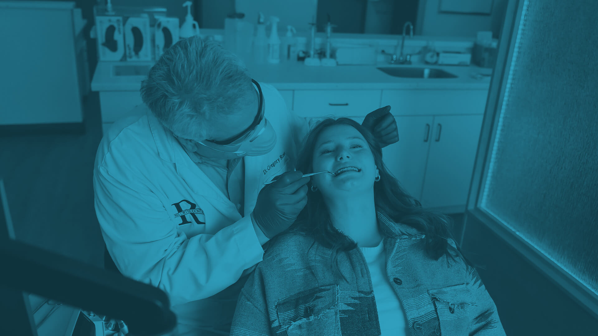 dr. ross working on patient